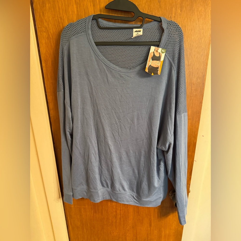 New with tags, ladies Avia mesh back long sleeve crew, color is blue, size XL
